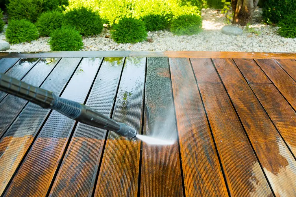 cleaning terrace with a power washer - high water pressure clean - Packard Power Washing deck mold removal